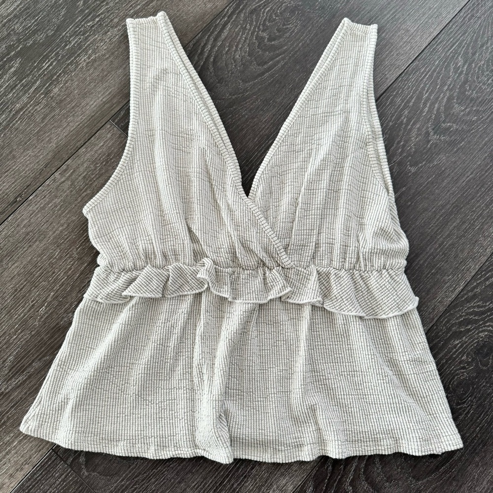 SOLD!!! Caution to the wind v-neck top.